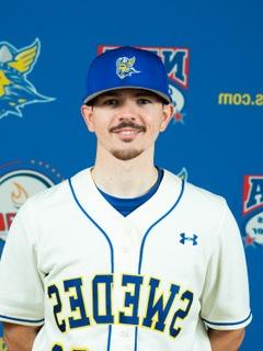 Connor wearing his baseball uniform